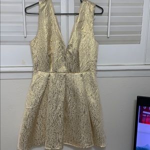 white and gold mini dress